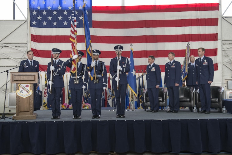 The Eielson base honor guard presents the colors for the National Anthem during the 354th Fighter Wing change of command ceremony, June 29, 2016, at Eielson Air Force Base. The Icemen Team gathered to welcome Col. David Mineau, the new 354th Fighter Wing commander, and say farewell to outgoing commander, Col. Michael Winkler. (U.S. Air Force photo by Staff Sgt. Ashley Nicole Taylor/Released)
