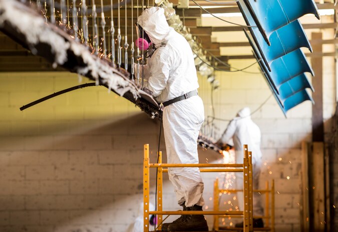 Senior Airman Michael Lugrain, 628th Civil Engineer Squadron water and fuels maintenance technician performs repairs on the small arms firing range at Joint Base Charleston, S.C., June 24, 2016.  The repairs were needed because the damaged baffles were preventing the use of 12 of 20 firing lanes. The re-faced baffles and repaired backstop will allow the range to be operated within safety guidelines, providing a safe environment for JB Charleston personnel to qualify on their shooting skills. (U.S. Air Force photo by Staff Sgt. Andrea Salazar/Released)