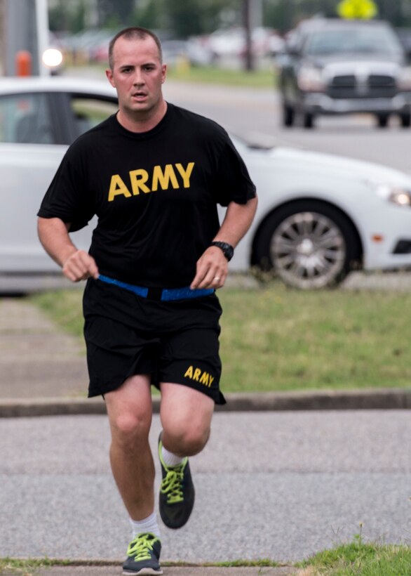 U.S. Army Capt. Ryan Hodgson, Center for Initial Military Training aide-de-camp, runs during the final event of the Civilian Commanders Cup Fitness Challenge at Fort Eustis, Va., June 23, 2016. The six-month competition was initiated to jumpstart the culture of civilian fitness and health by tracking their physical activity for points. (U.S. Air Force photo by Airman 1st Class Derek Seifert)