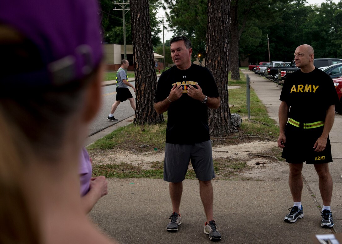 Hubert Davis, Headquarters Training and Doctrine Command assistant deputy chief of staff, speaks to participates before the final 5K run for the Civilian Commanders Cup Fitness Challenge at Fort Eustis, Va., June 23, 2016. Civilians working in units across the installation were encouraged to participate in the challenge to reach their fitness goals alongside their Army counterparts. (U.S. Air Force photo by Airman 1st Class Derek Seifert)