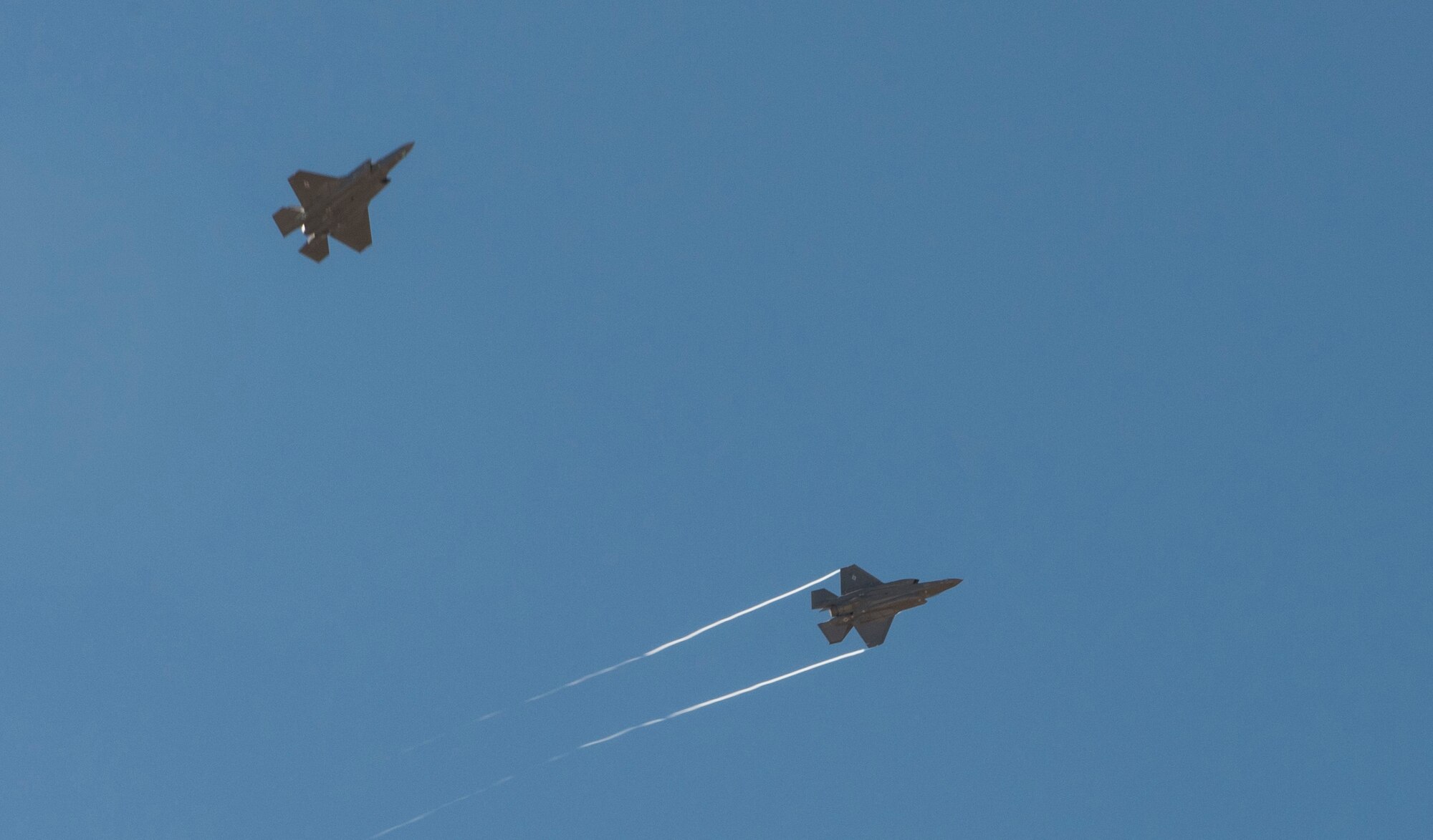 An F-35A separates from formation to land at Mountain Home Air Force Base, Idaho, for a training exercise June 6-17. Mountain Home AFB's airspace allows Hill Air Force Base's active duty 388th Fighter Wing and Reserve 419th Fighter Wing to fully test the aircraft in preparation for declaring initial operational capability, or IOC, later this year. (U.S. Air Force photo by Airman Alaysia Berry)