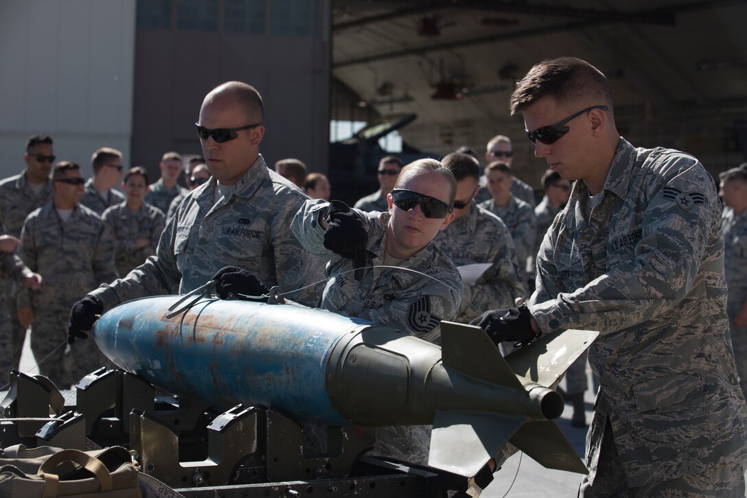 U.S. Air Force Airmen, assigned to ammunitions, 140th Wing, compete in a Weapons Ammunition Competition, Buckley Air Force Base, Colo., June 4, 2016. The WAMMO competition consisted of two teams, who built ammunitions and hoped to finish first with speed and accuracy. (U.S. Air National Guard photo by Staff Sgt. Bobbie Reynolds)