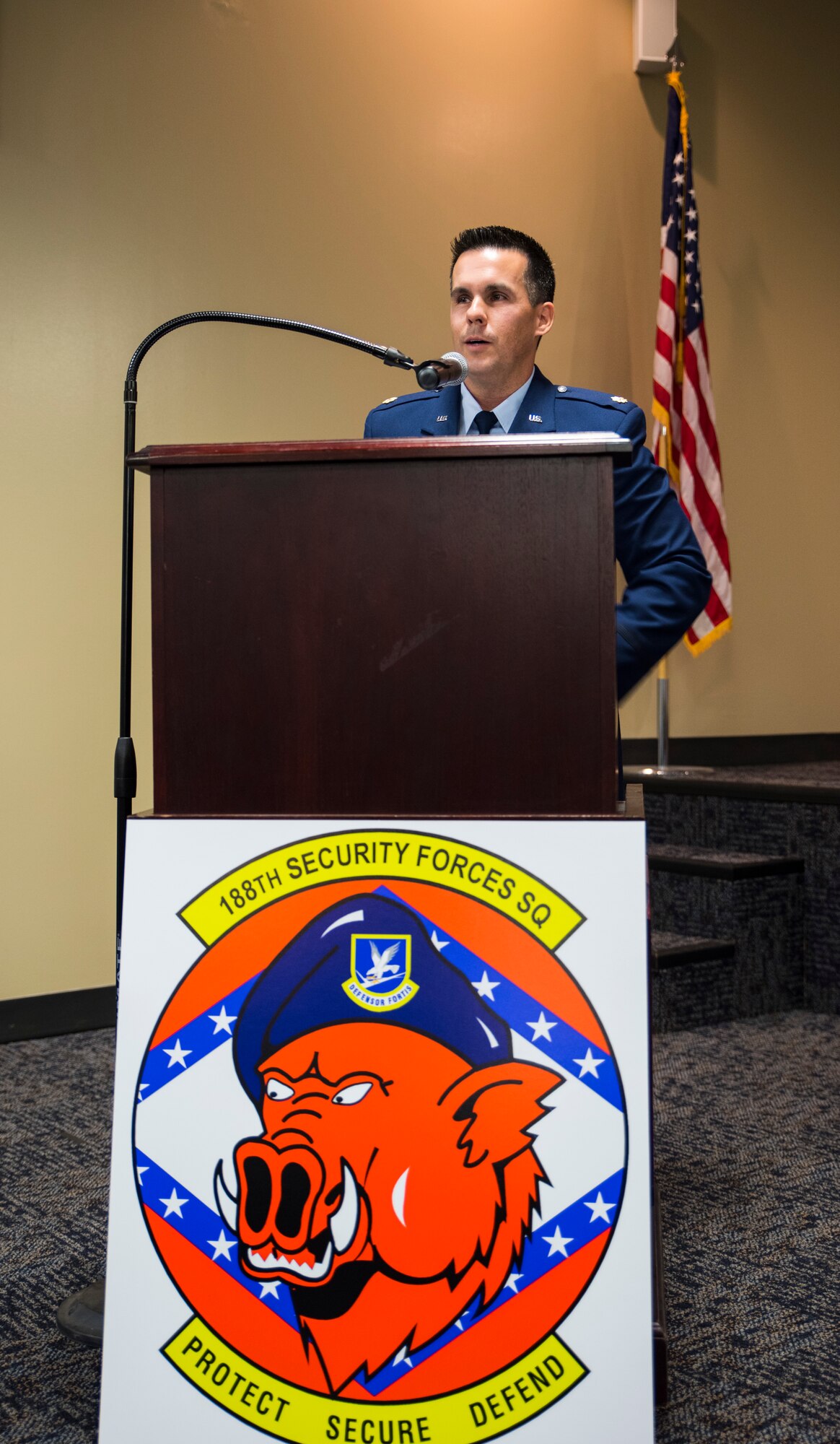 Maj. Heath Allen, previous 188th Wing executive officer, expresses his excitement and eagerness to serve as the commander of the 188th Security Forces Squadron June 26, 2016, during a change of command ceremony held at Ebbing Air National Guard Base, Fort Smith, Ark. Allen took over for Lt. Col. Mitch Long, 188th Mission Support Group deputy commander, as commander of the 188th SFS. (U.S. Air National Guard photo by Senior Airman Cody Martin/Released) 