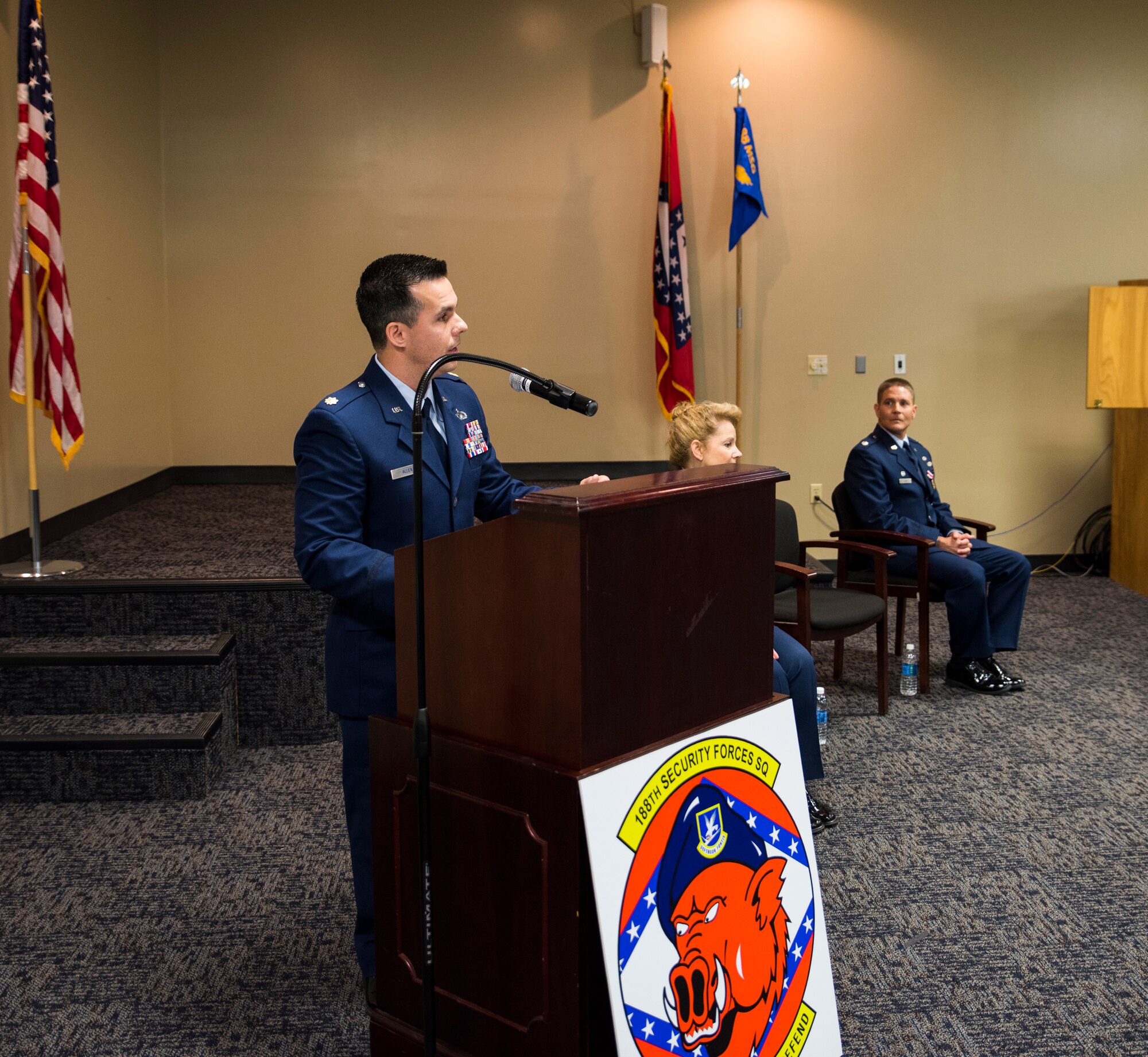 Maj. Heath Allen, previous 188th Wing executive officer, expresses his excitement and eagerness to serve as the commander of the 188th Security Forces Squadron June 26, 2016, during a change of command ceremony held at Ebbing Air National Guard Base, Fort Smith, Ark. Allen took over for Lt. Col. Mitch Long, 188th Mission Support Group deputy commander, as commander of the 188th SFS. (U.S. Air National Guard photo by Senior Airman Cody Martin/Released) 