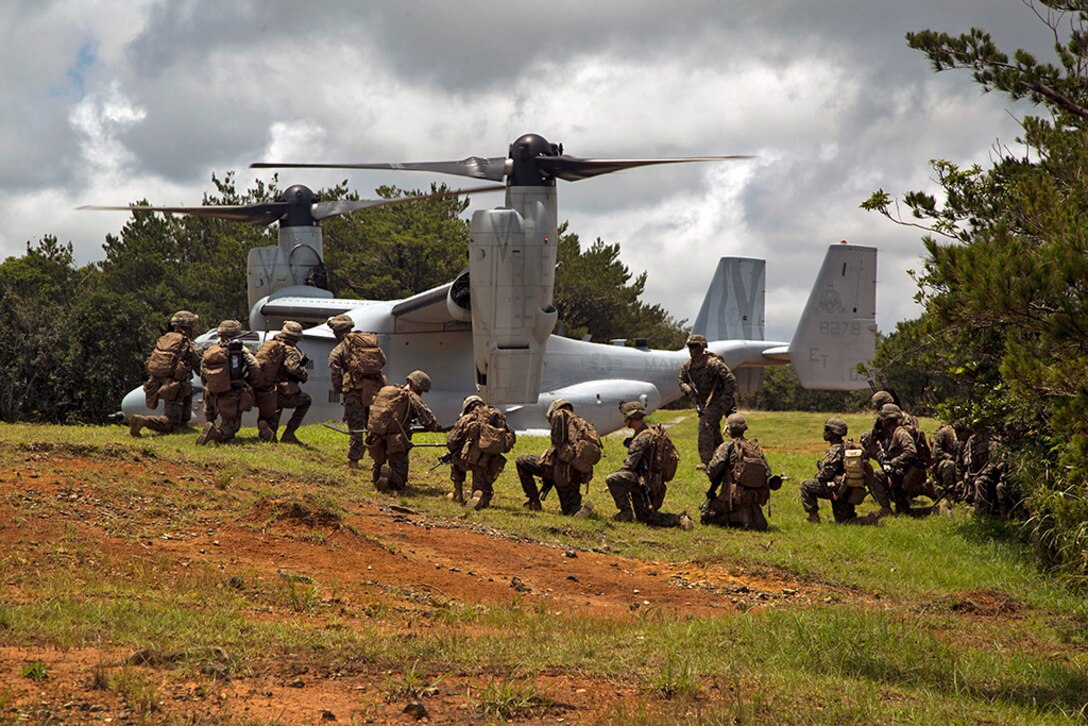 Marines conduct scenario based training as part of Marine Expeditionary Unit Exercise in preparation for the 31st MEU's upcoming fall deployment at the Jungle Warfare Training Center in Okinawa, Japan, June 25, 2016. Marine Corps photo by Cpl. Samantha Villarreal