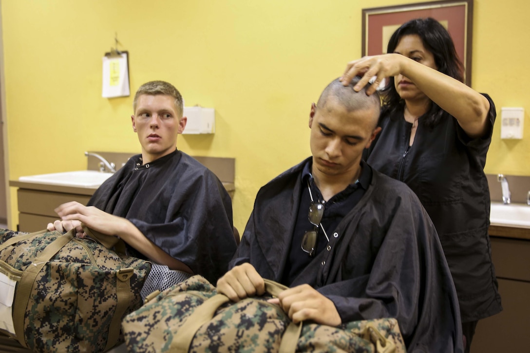 Marine Corps recruits receive their initial haircuts at Marine Corps Recruit Depot San Diego, June 27, 2016. Recruits receive haircuts immediately after arriving at the depot to create uniformity. The recruits are assigned to Fox Company, 2nd Recruit Training Battalion. Marine Corps photo by Lance Cpl. Angelica Annastas 