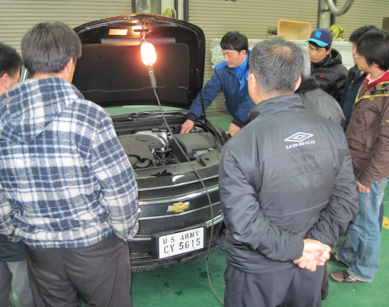 Mechanics of the Far East District's motor pool avail themselves of local training in order to stay informed and up-to-date with recent developments in automotive mechanics and electric vehicle technologies.