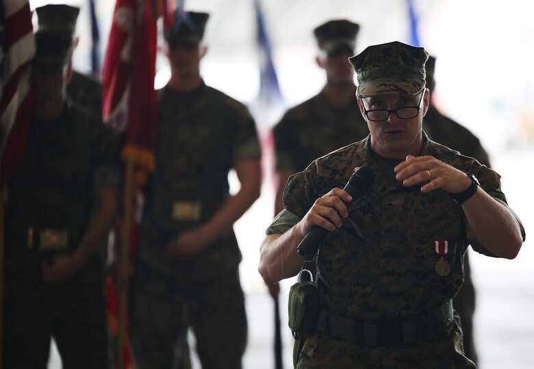 U.S. Marine Corps. Lt. Col. James S. Whiteker, Marine Wing Support Squadron (MWSS) 171 commanding officer, addresses the audience during his change of command ceremony at Marine Corps Air Station Iwakuni, Japan, June 30, 2016. Whiteker relinquished his duties as MWSS-171 commanding officer to Lt. Col. Jason B. Berg after serving as the squadron commander for two years. Whiteker notably led MWSS-171 to unprecedented levels of support for essential exercises, operations and humanitarian assistance efforts across the Pacific. For his efforts as the squadron commanding officer, Whiteker received the meritorious service medal gold star in lieu of a fourth award. (U.S. Marine Corps Photo by Sgt. Jessica Quezada/Released)