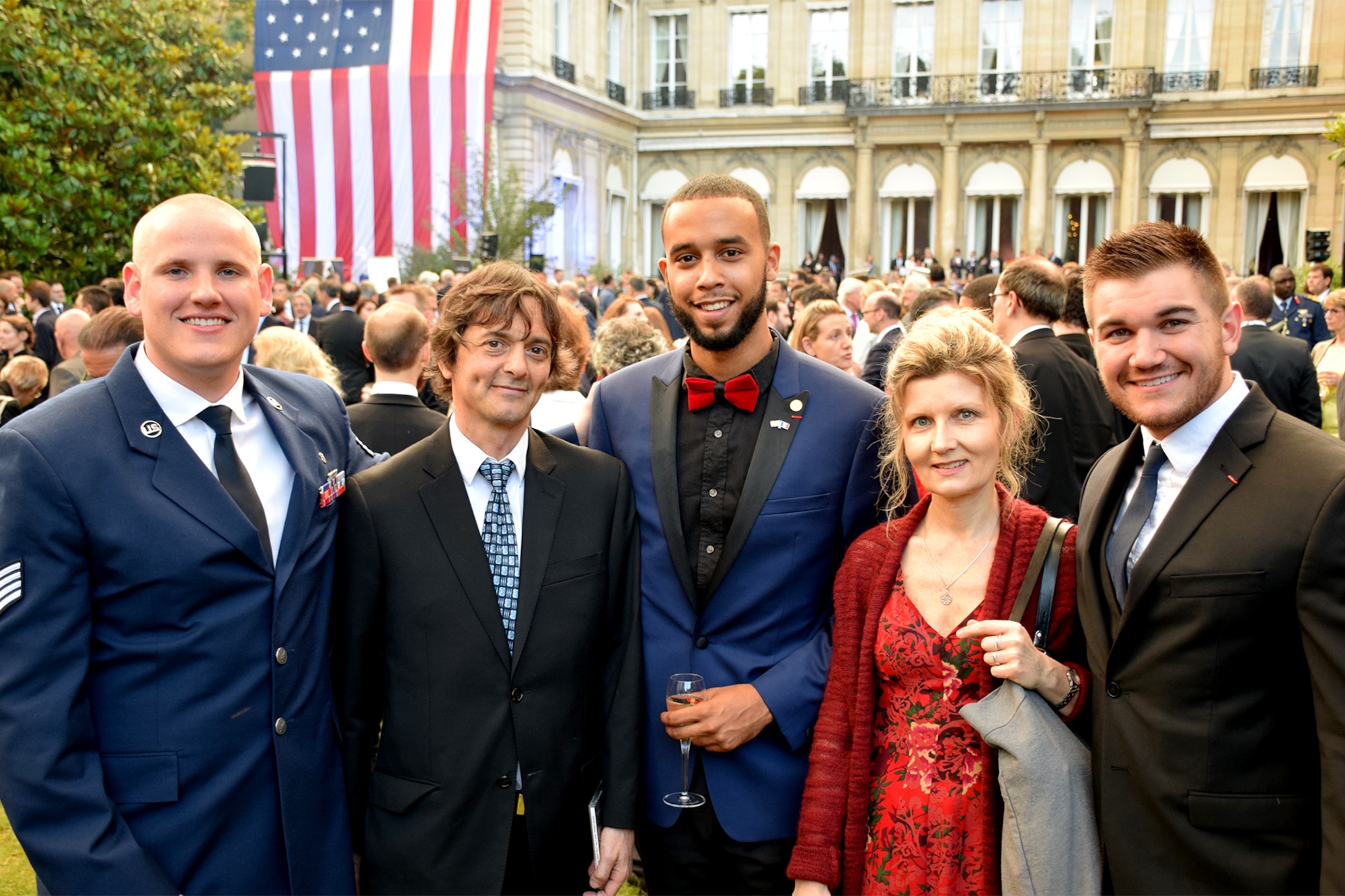 Staff Sgt. Spencer Stone, Mark Moogalian, Anthony Sadler, Isabella Risacher-Moogalian and Alex Skarlatos meet at the U.S. Ambassador in Paris residence during the U.S. Embassy Fourth of July reception June 27, 2016.  This was the first time the four were reunited since the foiled 2015 terrorist attack.  (U.S. Air Force/Master Sergeant Alex Griffin/Released)