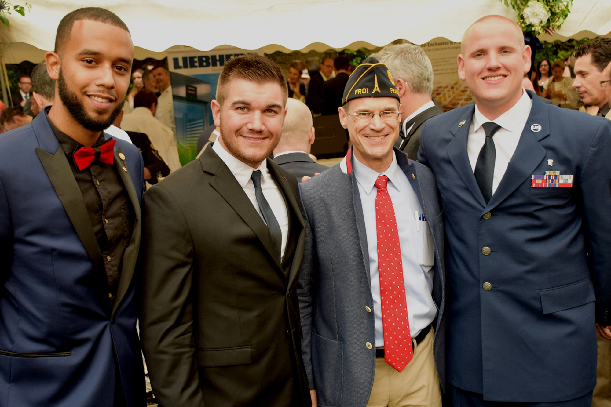 Anthony Sadler; Alex Skarlatos; Curtis Bartosik, American Legion Paris Post No.1 Secratary General; and Staff Sgt. Spencer Stone meet during the U.S. Embassy in Paris Fourth of July reception June 27, 2016.  Stone, Skarlatos and Sadler were the guests of honor for the celebration.  This was the first time they returned to France since foiling the 2015 terrorist attack. (U.S. Air Force/Master Sergeant Alex Griffin/Released)
