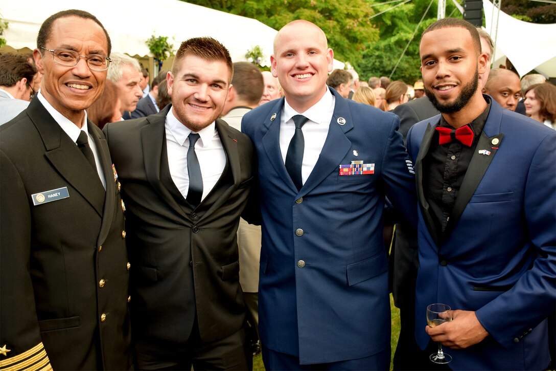 U.S. Navy Adm. Cecil D. Haney, commander, U.S. Strategic Command; Alek Skarlatos, Staff Sgt. Spencer Stone and Anthony Sadler meet during the U.S. Embassy in Paris Fourth of July reception June 27, 2016.  Stone, Skarlatos and Sadler were the guests of honor for the celebration.  This was the first time they returned to France since foiling the 2015 terrorist attack. (U.S. Air Force/Master Sergeant Alex Griffin/Released)
