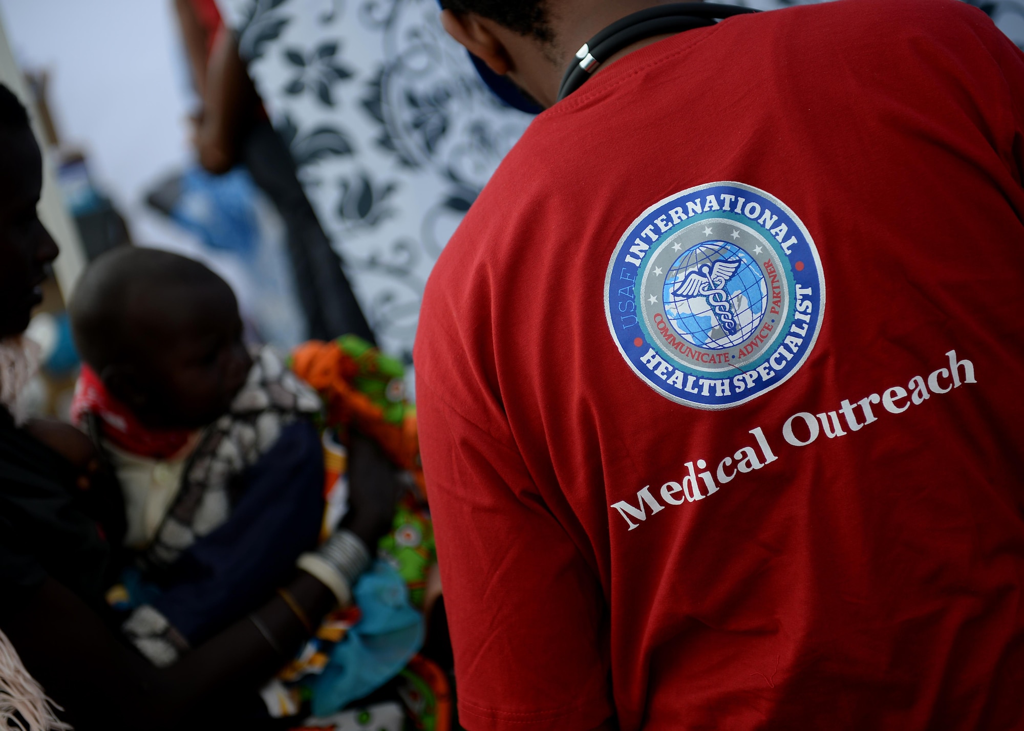 U.S. Air Force Airmen assist patients during a medical outreach event June 22, 2016 at Lokusero, Kenya. The medical outreach was part of the first African Partnership Flight in Kenya. Over the course of three days, medical assistance was provided for more than 1,250 patients. The APF is designed for U.S. and African partner nations to work together in a learning environment to help build expertise and professional knowledge and skills. (U.S. Air Force photo by Tech. Sgt. Evelyn Chavez/Released)