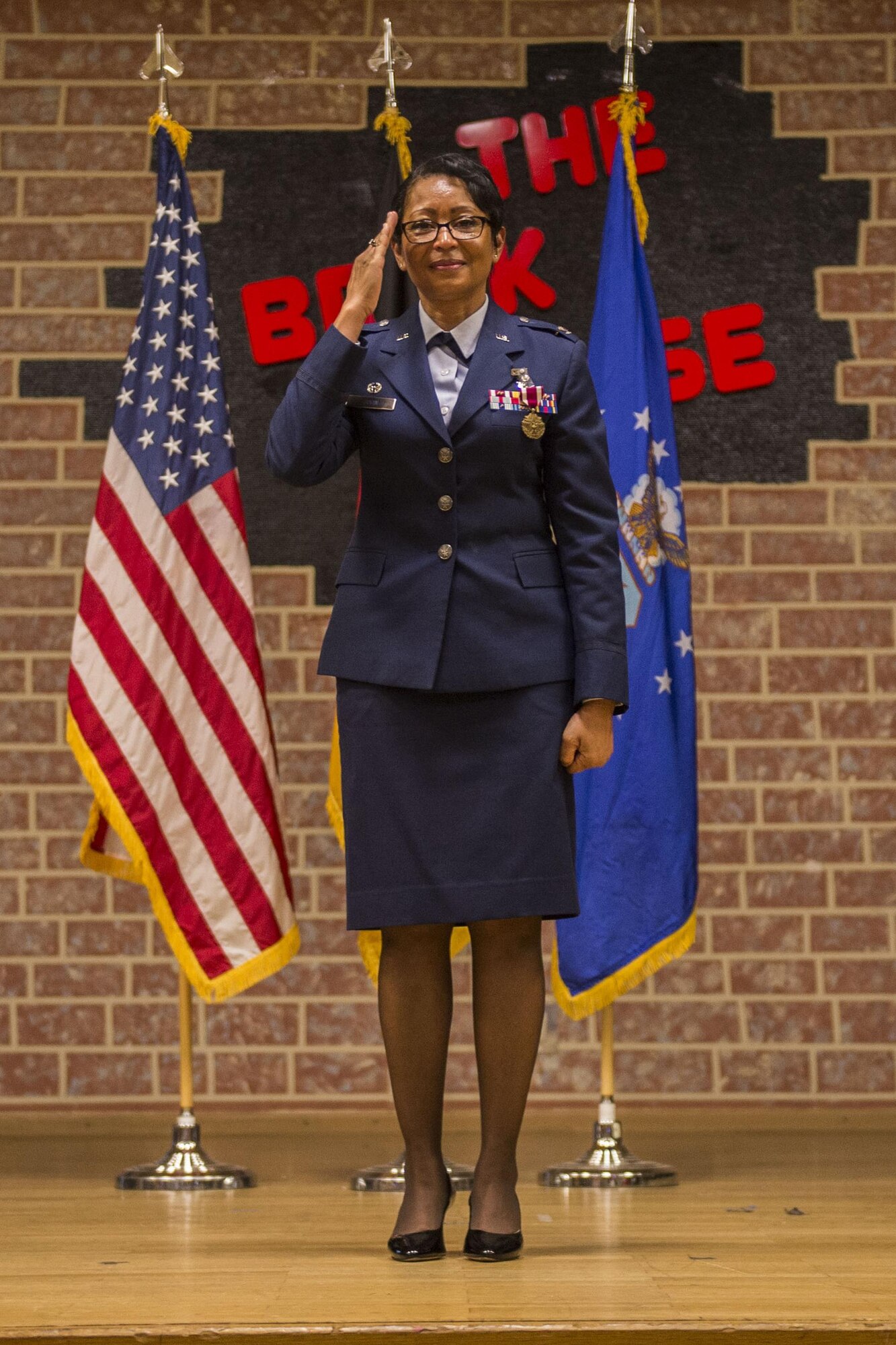 U.S. Air Force Col. Patricia John, former 52nd Medical Operations Squadron commander, delivers a last salute to her former squadron during during the 52nd MDOS change of commander ceremony at the Brickhouse on Spangdahlem Air Base, Germany, June 29, 2016. John served as the 52nd MDOS commander since May 2014 before relinquishing command to U.S. Air Force Lt. Col. Rebecca Elliott, 52nd MDOS commander. (U.S. Air Force photo by Senior Airman Luke Kitterman/Released)