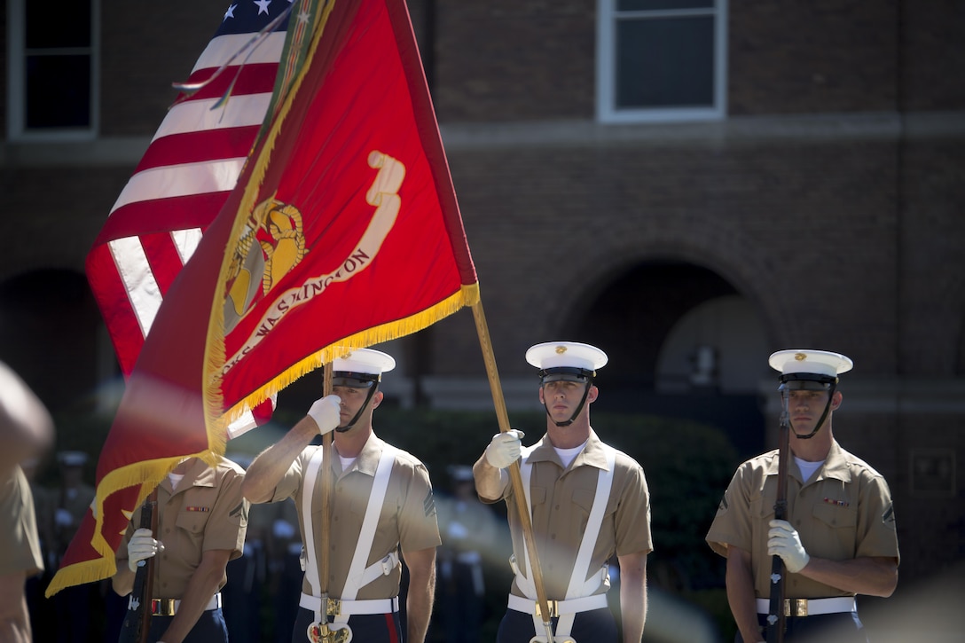 The United States Marine Corps Color Guard performs during the change of command ceremony of Marine Barracks Washington, D.C., Jun. 29, 2016.  During the ceremony Col. Benjamin T. Watson, the commanding officer for nearly two years, relinquished command of the unit to Col. Tyler J. Zagurski. (Official Marine Corps photo by Cpl. Chi Nguyen/Released)