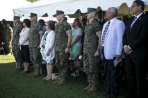 U.S. Marines and guests stand at attention during the 2nd Marine Logistics Group change of command ceremony on Camp Lejeune, N.C., June 8, 2016.  Brig. Gen. Charles G. Chiarotti, outgoing commander, relinquished command to Col. Daniel P. O’Hora. (U.S. Marine Corps photo by Lance Cpl. Samantha A. Barajas)