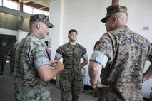 Lt. Gen. John E. Wissler, right, commander of U.S. Marine Forces Command,  speaks with Marines of 2nd Assault Amphibian Battalion, 2nd Marine Division, while visiting Camp Lejeune, N.C., June 8, 2016. (U.S. Marine Corps photo by Lance Cpl. Samantha A. Barajas)