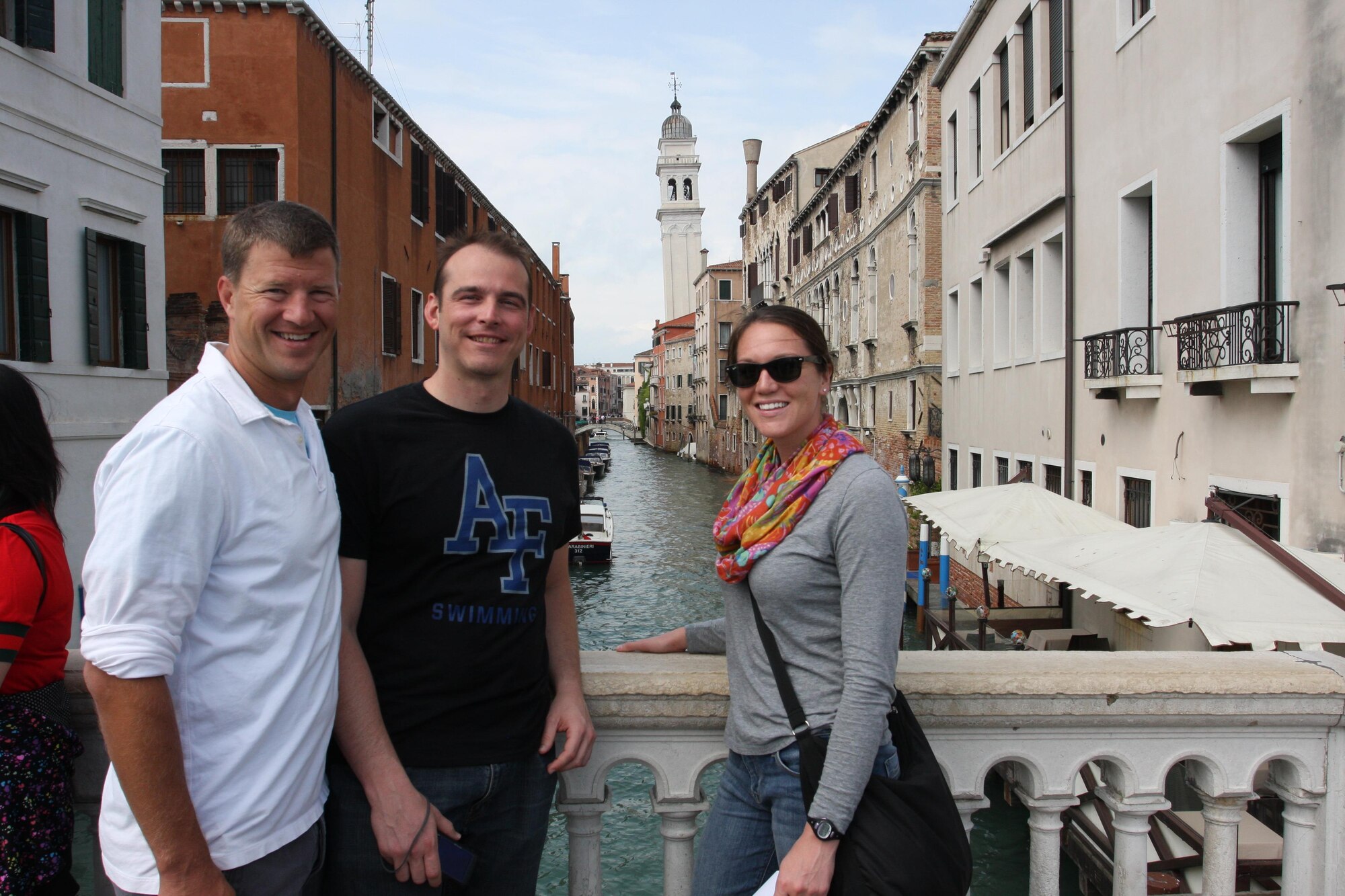Members of the Air Force/U.S. Air Forcesin Europe swim team tour Venice during a cultural appreciation day before the Allied Air Forces Championships, May 10-12 at Aviano Air Base, Italy. Swimmers included, from left, coach Maj. Edward Steinfort, and competitors Maj. John Dayton and Capt. Lauren Hale. (U.S. Air Force photo/Stephen Brown/released)