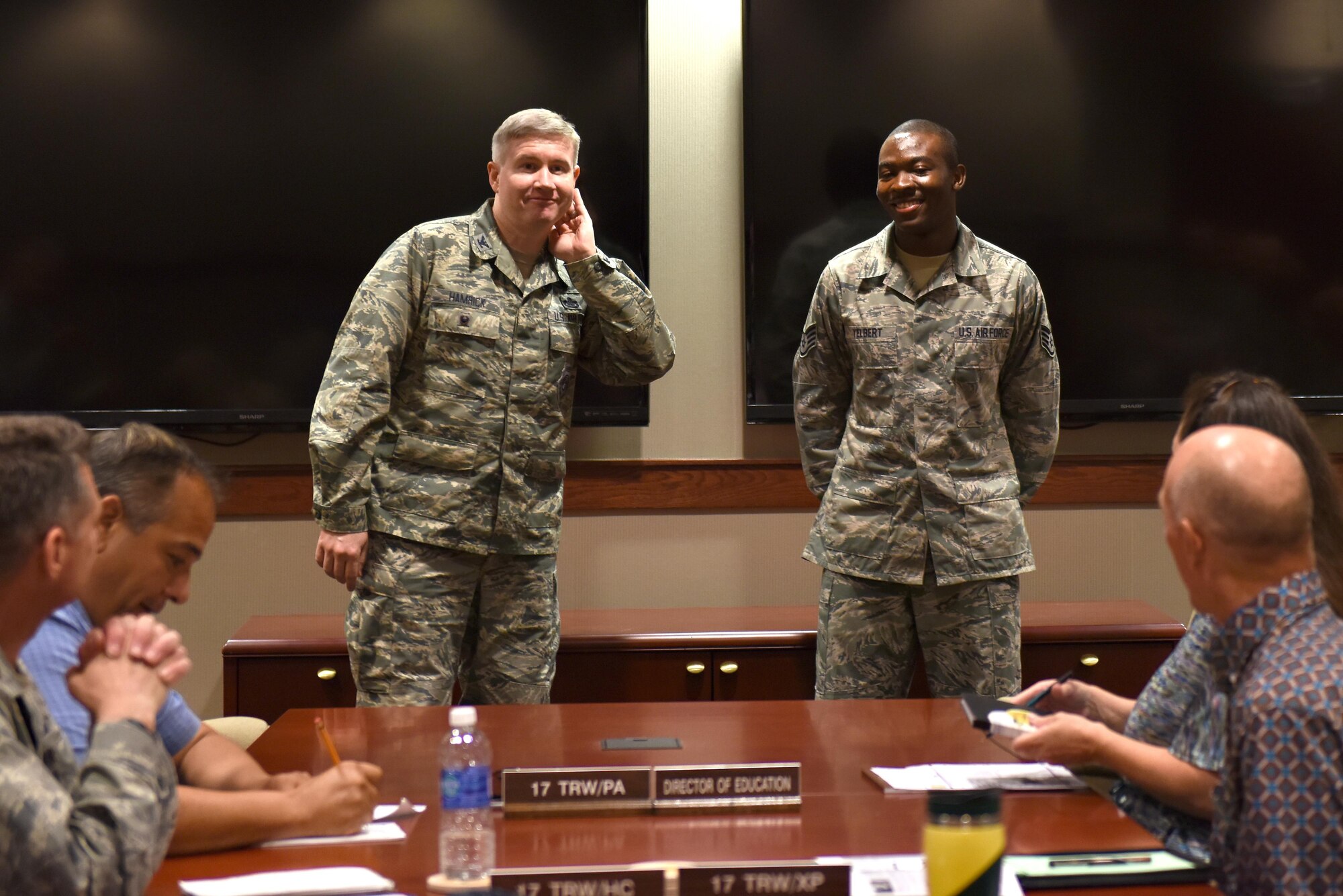 U.S. Air Force Col. Terry Hamrick, 17th Training Wing Vice Commander, gives a shout out to Staff Sgt. Stephen Yelbert, 17th Comptroller Squadron financial services technician and reports and analysis NCO in charge, for his achievements at the Norma Brown Building on Goodfellow Air Force Base, Texas, June 28, 2016. Yelbert received an Air Force 2016 Club Scholarship for $4,000. (U.S. Air Force photo by Airman 1st Class Caelynn Ferguson/Released)