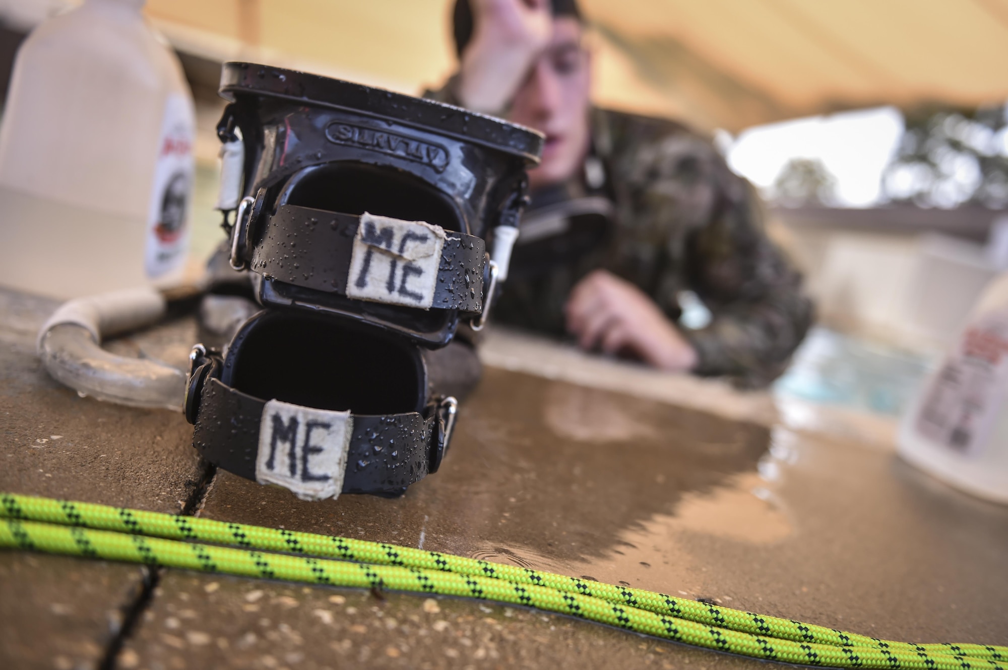 A Special Tactics Training Squadron student rests during a pre-scuba class at Hurlburt Field, Fla., June 29, 2016. The training familiarizes trainees with the basics of water operations. The trainees perform tasks such as tying knots underwater, learning how to stay afloat without their arms and hands, and how to use snorkeling gear. Special Tactics students later apply this knowledge to combat dive training. This training also reproduces physiological effects similar those experienced on the battlefield, and thus builds the necessary mental resiliency for ground special operations force. (U.S. Air Force photo by Senior Airman Ryan Conroy) 
