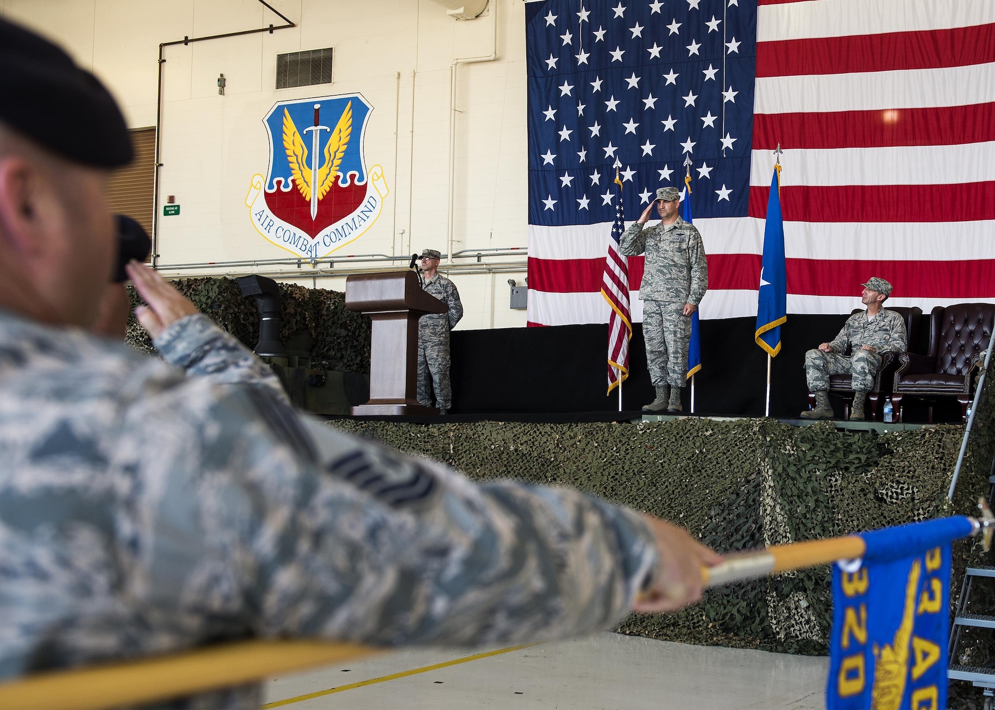 U.S. Air Force Airmen render the first salute to Col.  Jeffery Valenzia, incoming 93d Air Ground Operations Wing commander, during a change of command ceremony, June 28, 2016 at Moody Air Force Base, Ga. The 93d AGOW provides worldwide deployable, fully integrated capabilities at a moment’s notice, and remains the joint expert on integration of air power and combat weather support to ground forces. (U.S. Air Force photo by Airman 1st Class Janiqua P. Robinson/Released)
