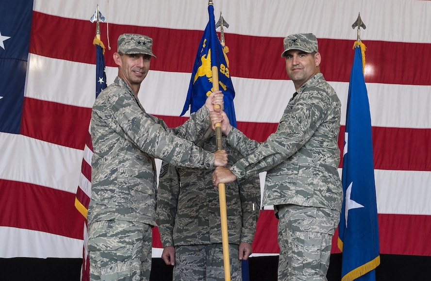 U.S. Air Force Maj. Gen. Scott Zobrist, Ninth Air Force commander, hands the guidon to Col.  Jeffery Valenzia, incoming 93d Air Ground Operations Wing commander, June 28, 2016, at Moody Air Force Base, Ga. Valenzia has served at the Pentagon, Washington D.C., as a Special Assistant to the Chairman of the Joint Chiefs of Staff, and as the vice commander for the 8th Fighter Wing at Kunsan Air Base, Republic of Korea. (U.S. Air Force photo by Airman 1st Class Janiqua P. Robinson/Released)