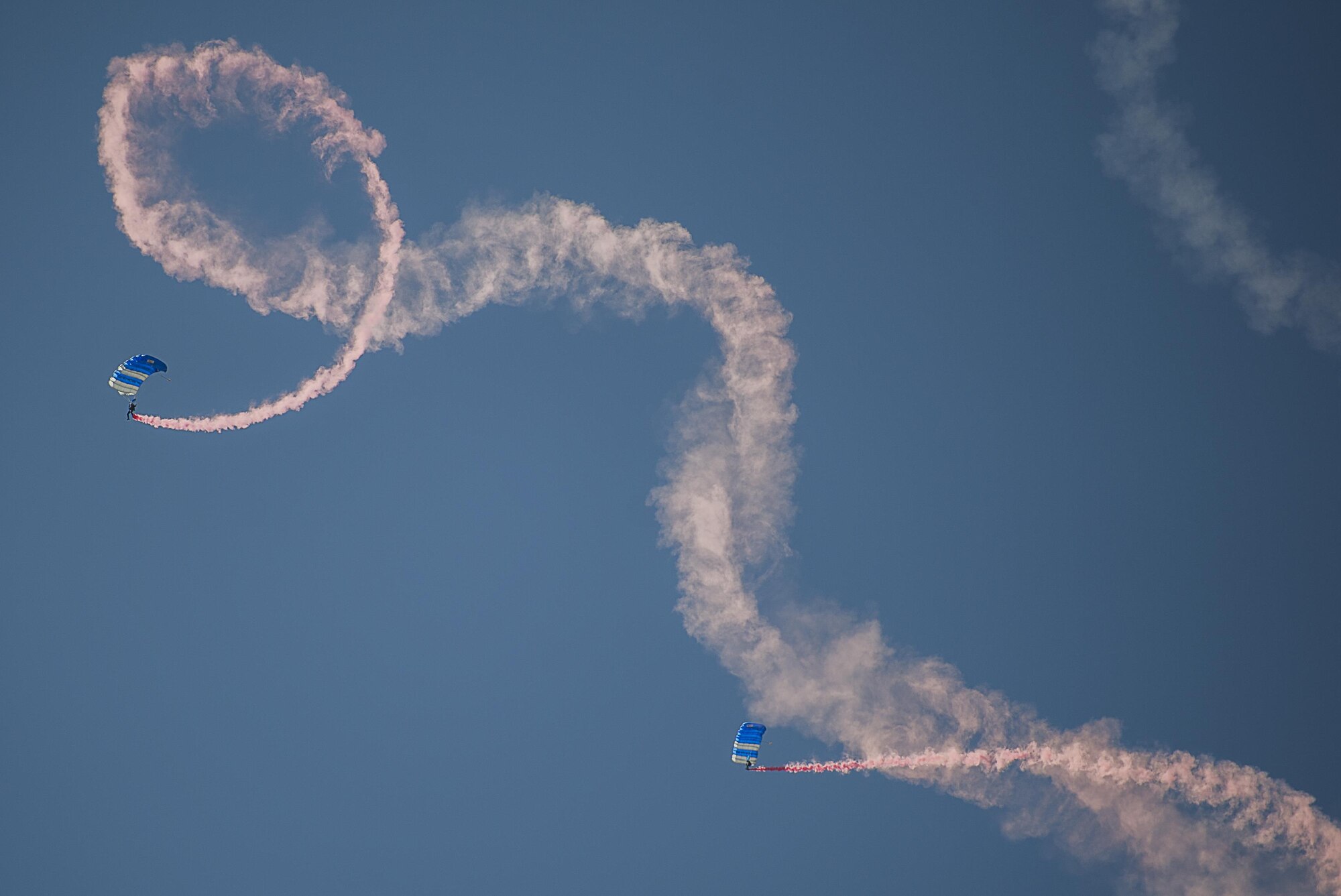 The U.S. Air Force Academy “Wings of Blue” perform during an air show at Cannon Air Force Base, N.M, May 28, 2016. The air show provided an opportunity to celebrate the long-standing relationship between the 27th Special Operations Wing and the local community. (U.S. Air Force photo/Master Sgt. Dennis J. Henry Jr.)