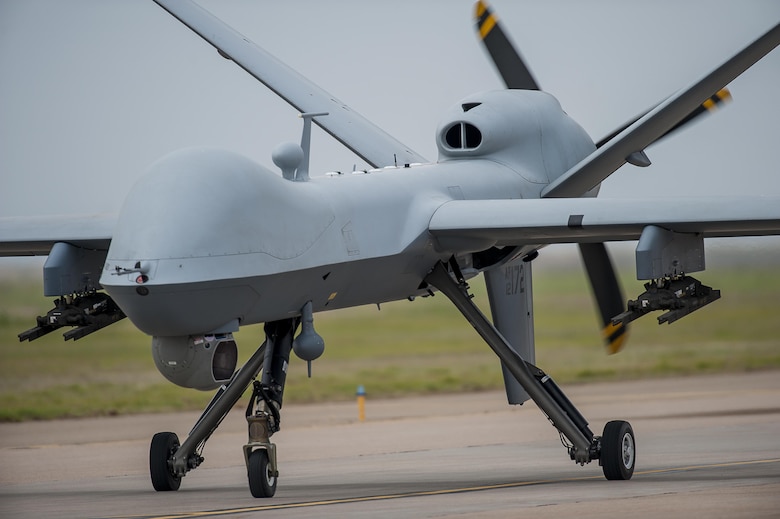 An MQ-9 Reaper performs a low pass during its first air show demonstration May 29, 2016, at Cannon Air Force Base, N.M. The 2016 Cannon AFB air show highlighted the base’s aerial capabilities and also celebrated the long-standing relationship between the 27th Special Operations Wing and the local community. (U.S. Air Force photo/Master Sgt. Dennis J. Henry Jr.)