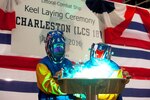 16028-N-RA705-001 MOBILE, Alabama (June 28, 2016)U.S. Rep. Bradley Byrne (R-AL) served as the honorary keel authenticator during the ceremony and was present to weld his initials into the keel plate. The Program Executive Office Littoral Combat Ships is responsible for delivering and sustaining littoral mission capabilities to the fleet while balancing affordability and capability. (Released)