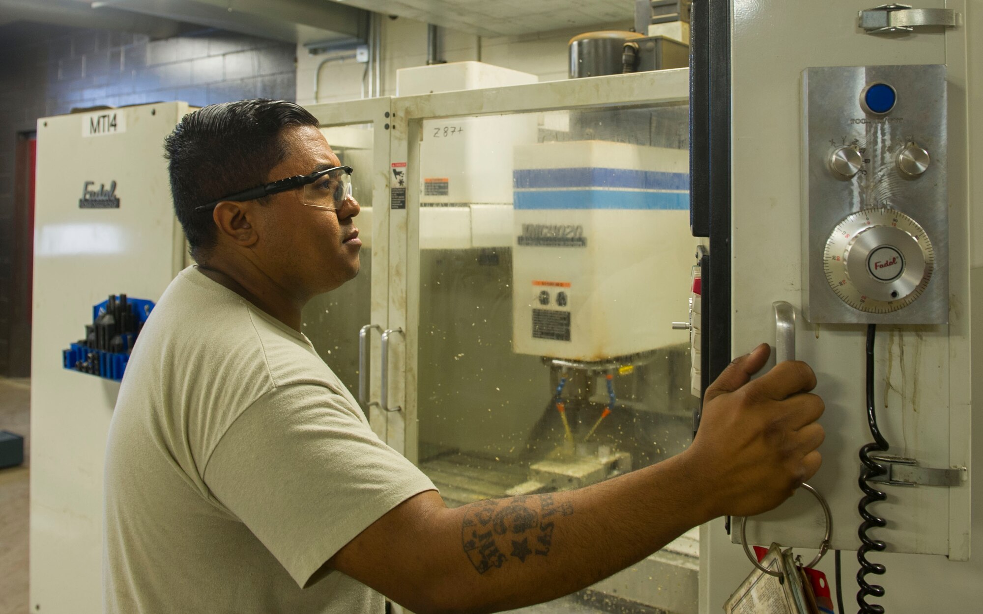 Staff Sgt. Michael Jarnegan, 5th Maintenance Squadron metals technology craftsman, checks on a metal part at Minot Air Force Base, N.D., June 29, 2016. This particular part, used on a weapons system, takes nearly 24 hours to complete. (U.S. Air Force photo/Senior Airman Apryl Hall)