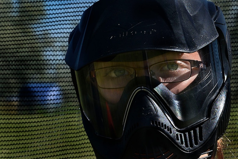 Kayla Wheeler, a member of the youth center at Minot Air Force Base, N.D., poses for a photo during Paintball 101 June 17, 2016. Members of the youth center were offered the opportunity to learn the basic skills of paintball from professionals. (U.S. Air Force photo/Airman 1st Class Jessica Weissman)