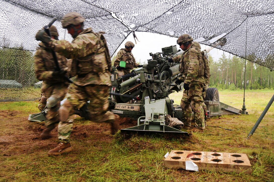 Soldiers conduct a howitzer fire mission rehearsal before participating in a combined forces live-fire exercise with multinational units during Saber Strike 16 in Tapa, Estonia, June 20, 2016. Army photo by Spc. Sandy Barrientos