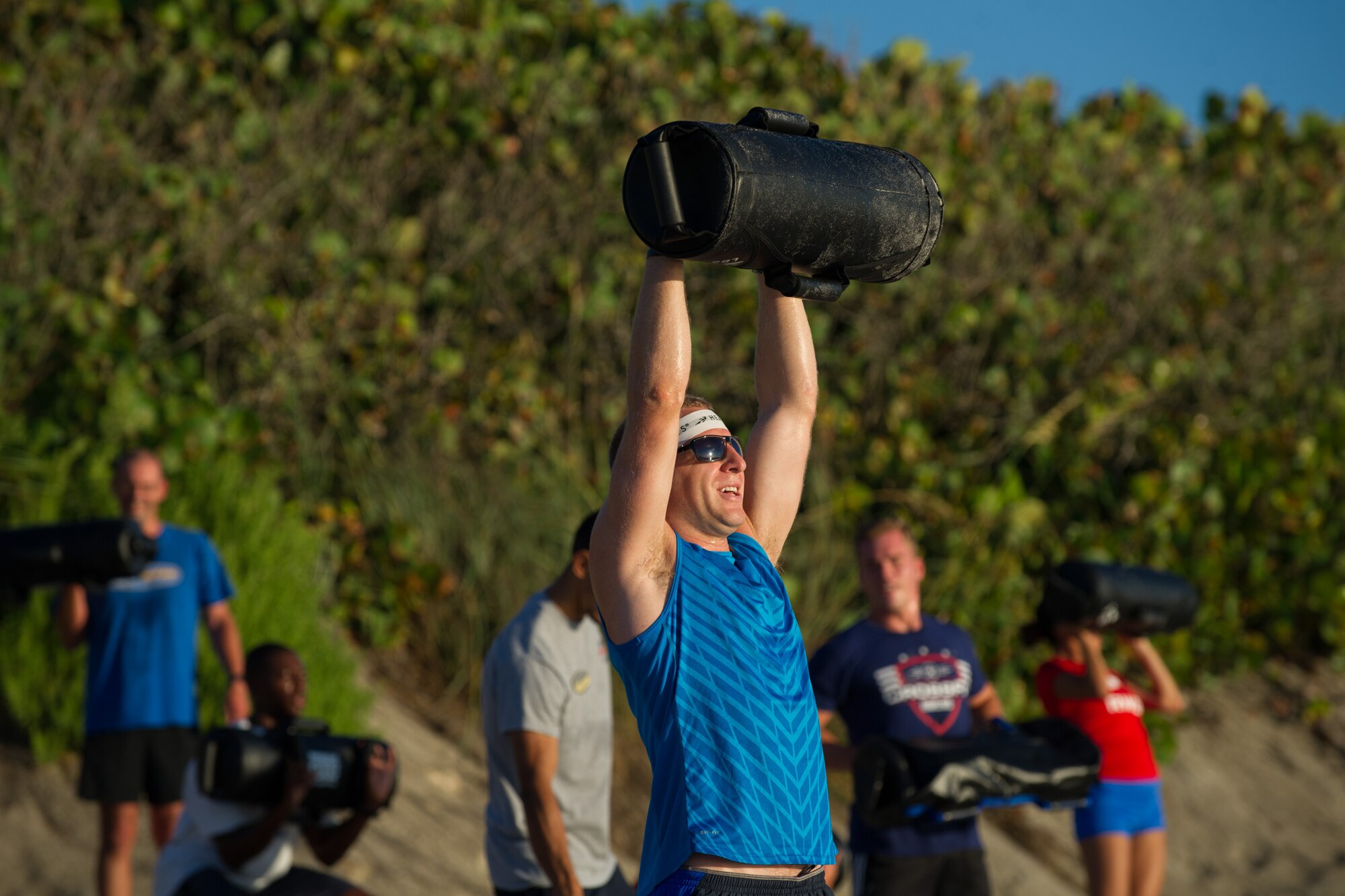 Members of the 45th Space Wing compete in a three mile run to celebrate America's 240th birthday June 30, 2016, at the Beach House Patrick Air Force Base, Fla. The 45th Force Support Squadron hosted the Independence Day Beach Run, including a sandbag circuit of repetitions, one for each year since the birth of the country. (U.S. Air Force photos/Benjamin Thacker/Released)