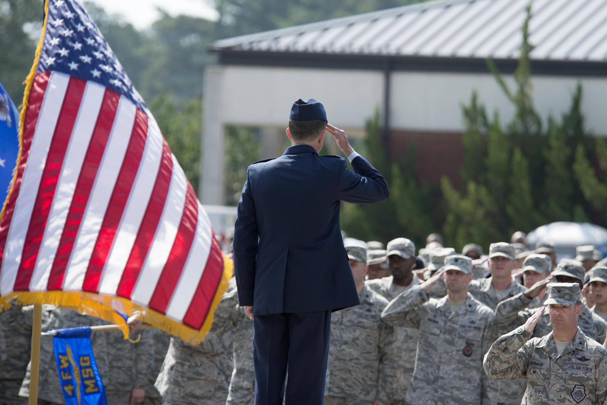 Col. Christopher Sage, 4th Fighter Wing commander, gives his first salute to members of the wing June 30, 2016, at Seymour Johnson Air Force Base, North Carolina. Sage was assigned to Seymour Johnson twice before and has logged more than 4,100 flight hours, including 1,100 combat hours during his 22-year career. (U.S. Air Force photo/Tech. Sgt. Chuck Broadway)