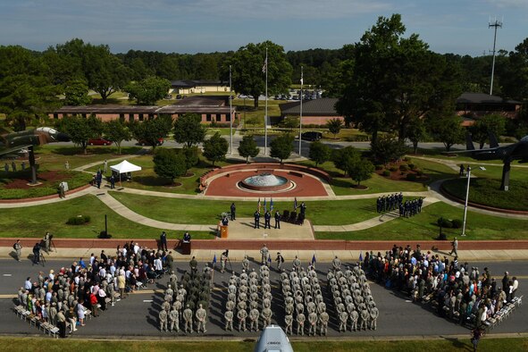 Airmen of the 4th Fighter Wing stand in formation during a change of command ceremony, June 30, 2016, at Seymour Johnson Air Force Base, North Carolina. Col. Christopher Sage, the former senior military assistant to the deputy chairman of the NATO Military Committee in Brussels, Belgium, assumed command from Col. Mark Slocum during the ceremony. (U.S. Air Force photo by Airman Shawna L. Keyes/Released)