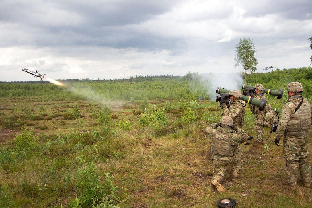 Army Spc Jose Enriquez, center, fires a javelin anti-tank missile at a target during Saber Strike 16 in Tapa, Estonia, June 20, 2016. Enriquez is a cavalry scout assigned to the 2nd Cavalry Regiment. Army photo by Staff Sgt. Jennifer Bunn