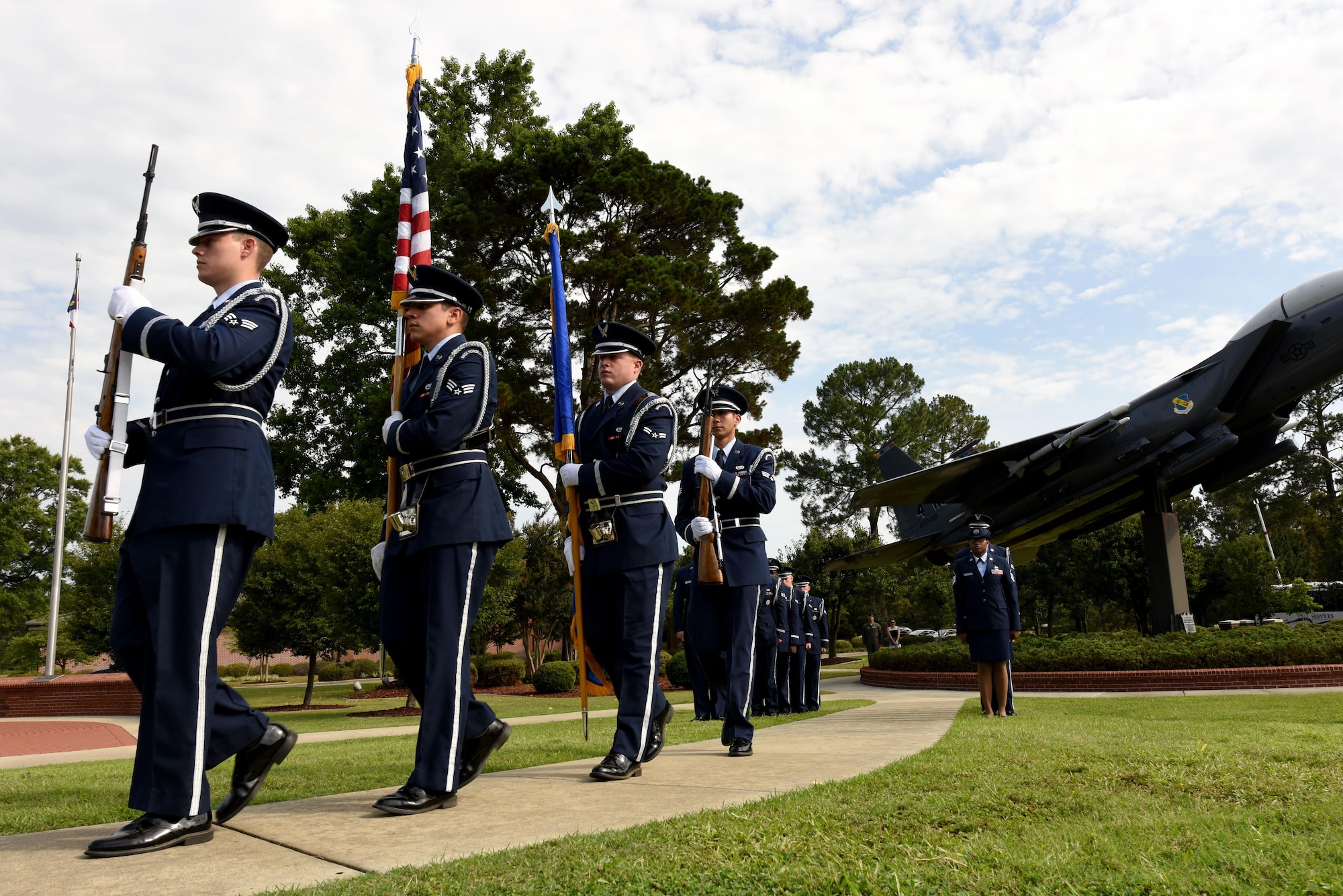Members of the 4th Fighter Wing honor guard arrives at the 4th FW change of command ceremony, June 30, 2016, at Seymour Johnson Air Force Base, North Carolina. Col. Mark Slocum relinquished command to Col. Christopher Sage during the ceremony. (U.S. Air Force photo/ Airman 1st Class Ashley Williamson)