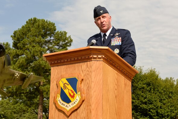 Col. Mark Slocum, outgoing 4th Fighter Wing commander, speaks to Airmen during the 4th Fighter Wing change of command ceremony, June 30, 2016, at Seymour Johnson Air Force Base, North Carolina. Slocum relinquished command to Col. Christopher Sage, who has served at Seymour Johnson AFB on two previous assignments. (U.S. Air Force photo/Airman 1st Class Ashley Williamson)