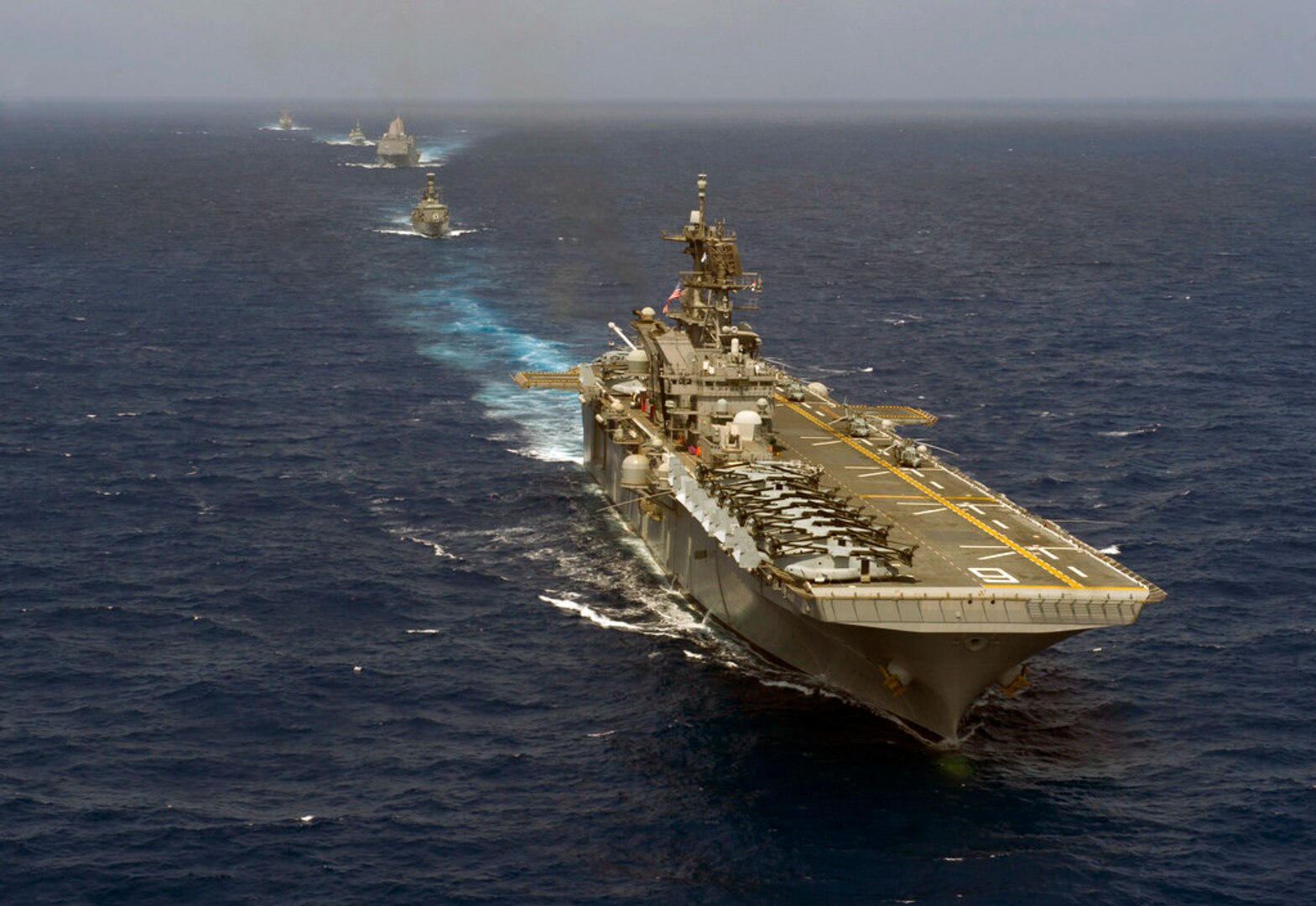 PACIFIC OCEAN (June 24, 2016) - The amphibious assault ship USS America (LHA 6), Royal Canadian Navy frigate Her Majesty's Canadian Ship Vancouver (FFH 331), Chilean Navy frigate CNS Cochrane (FF 05), amphibious transport dock ship USS San Diego (LPD 22), and guided-missile destroyer USS Howard (DDG 83) steam in formation while transiting to Rim of the Pacific 2016. Twenty-six nations, more than 40 ships and submarines, more than 200 aircraft and 25,000 personnel are participating in RIMPAC from June 30 to Aug. 4, in and around the Hawaiian Islands and Southern California. The world's largest international maritime exercise, RIMPAC provides a unique training opportunity that helps participants foster and sustain the cooperative relationships that are critical to ensuring the safety of sea lanes and security on the world's oceans. RIMPAC 2016 is the 25th exercise in the series that began in 1971. 