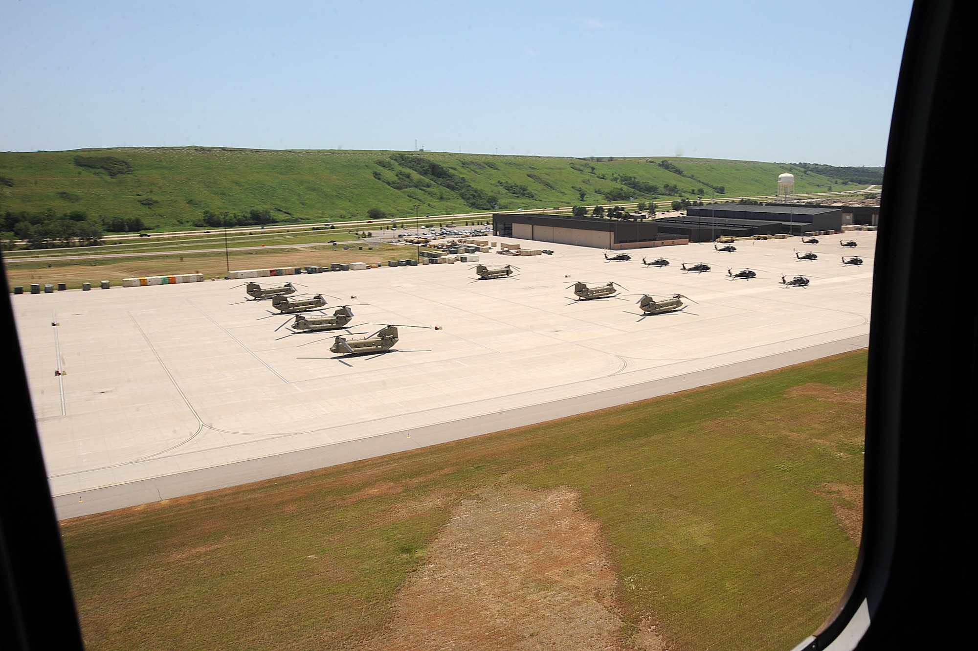 A UH-60 Blackhawk takes off from the flightline, June 22, 2016, at Fort Riley, Kan. The UH-60 carried joint terminal attack control Airmen who provided pararescue support as they coordinated personnel recovery and close air support training operations. (U.S. Air Force photo/Airman 1st Class Jenna K. Caldwell)