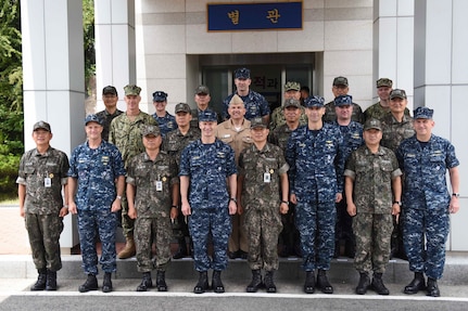 BUSAN, Republic of Korea (June 30, 2016) - Vice Adm. Joseph P. Aucoin, the commander of U.S. 7th Fleet, and Vice Adm. Lee, Ki-sik, the commander of the Republic of Korea Fleet, pose for a photo with their respective warfare commanders after an Anti-Submarine Warfare (ASW) Cooperation Committee discussion. The event brought together senior naval leaders from both nations to discuss ASW operations, capabilities and strategic dialogue between the two maritime partners. 