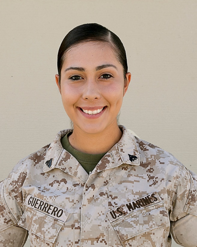 Cpl. Crystal M. Guerrero, small arms repair technician, Headquarters Battalion, developed her love of weapons and desire to work in the armory from her father who was a Marine and taught her. (Official Marine Corps photo by Lance Cpl. Dave Flores/Released)