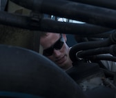 U.S. Air Force Staff Sgt. Aaron Paecht, 18th Logistics Readiness Squadron assistant NCO in charge of training, validation and operations, inspects parts of a tractor-trailer during training June 29, 2016, at Kadena Air Base, Japan. A thorough inspection of the different parts of the tractor-trailer is necessary before conducting any missions. (U.S. Air Force photo by Airman 1st Class Lynette M. Rolen)