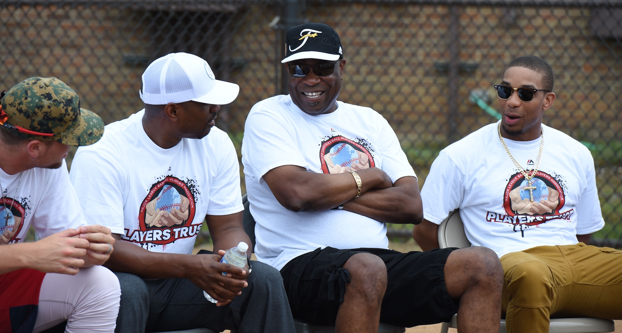 Washington Nationals team members (from left to right) Blake Treinen, pitcher, Jacque Jones, assistant hitting coach, Johnnie “Dusty” Baker, manager, and Ben Revere, outfielder, do a Q&A with children of military personnel at the Major League Baseball Players Trust City Clinic’s youth baseball clinic on Joint Base Andrews, Md., June 28, 2016. The Players Trust, DC Grays, a Cal Ripken Collegiate Baseball League team, and USO Metro coordinated this event. More than 100 children attended the clinic, receiving coaching from collegiate and professional baseball players, as well as free baseballs, gloves, T-shirts and autograph cards. (U.S. Air Force photo by Senior Airman Joshua R. M. Dewberry)