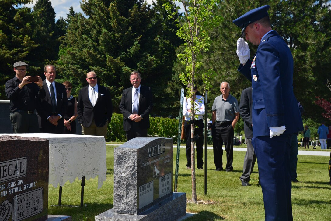 Lt. Col. Michael Epper, 341st Force Support Squadron commander, pays his respects to retired Gen. Robert Mathis during his funeral June 29, 2016, in Bozeman, Mont. Mathis served 34 years in the U.S. Air Force, and was the vice chief of staff of the Air Force 1980-1982. (U.S. Air Force photo/ Airman 1st Class Daniel Brosam)