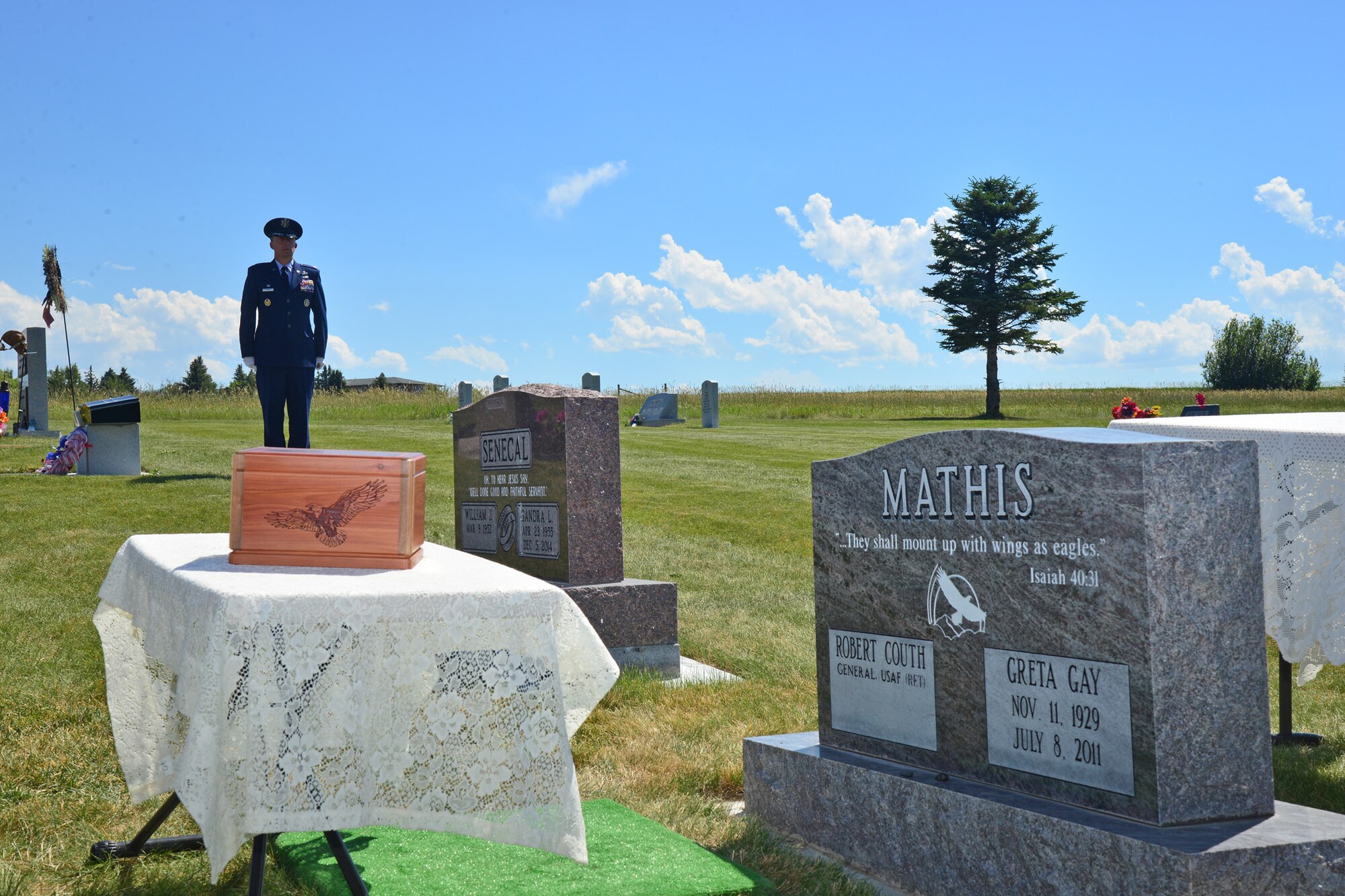 Lt. Col. Michael Epper, 341st Force Support Squadron commander, stands at attention during a funeral service for retired Gen. Robert Mathis June 29, 2016, in Bozeman, Mont. Mathis served 34 years in the U.S. Air Force, and was the vice chief of staff of the Air Force 1980-1982. (U.S. Air Force photo/ Airman 1st Class Daniel Brosam)
