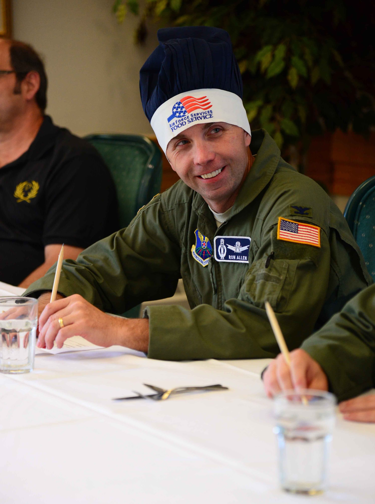 Col. Ron Allen, 341st Missile Wing commander, assists in judging a Warrior Chef Competition June 22, 2016, at Malmstrom Air Force Base, Mont. Allen took command of the 341st MW April 19, and has been adjusting to his leadership by meeting Airmen and learning how they accomplish day-to-day tasks to ensure mission success. (U.S. Air Force photo/Airman 1st Class Magen M. Reeves)