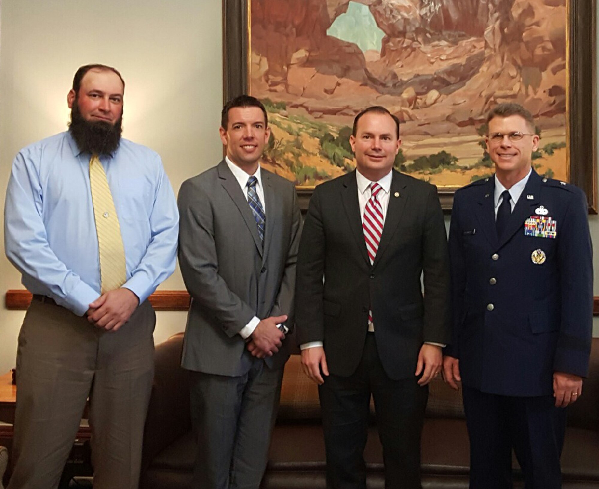 Left to right: Matthew Bates, 309th Maintenance Support Squadron, Evan Edwards, 309th Software Maintenance Group, Utah Sen. Mike Lee and Brig. Gen. Steven J. Bleymaier, Ogden Air Logistics Complex commander. (Courtesy photo)