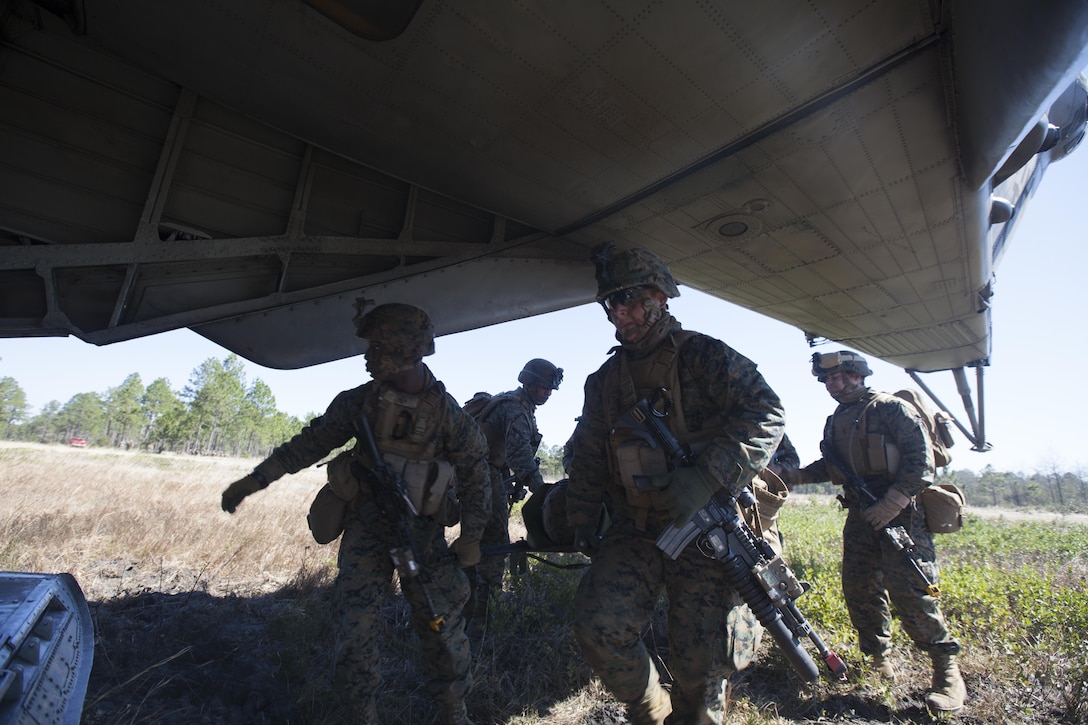 Marines with India Company, 3rd Battalion, 6th Marine Regiment conduct casualty evacuation drills during Exercise Eager Response at Fort Stewart, Ga., Feb. 25, 2016. Marines trained in events such as casualty evacuation, assault support missions and aerial refueling, proving the Marine Air-Ground Task Force is a highly effective combat force.  (U.S. Marine Corps photo by Pfc. Nicholas P. Baird/Released)