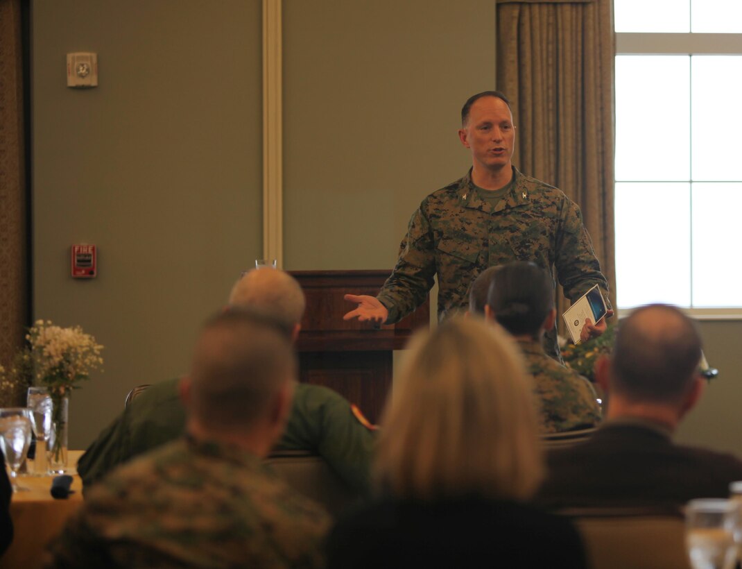 Colonel Chris Pappas III speaks to volunteers and service members during the Navy-Marine Corps Relief Society and Cherry Point Volunteer Awards and Recognition Ceremony at Marine Corps Air Station Cherry Point, N.C., Feb. 22, 2016. The ceremony was held to honor the volunteers for their dedicated service and the countless hours they have contributed to the progression of Marines and Sailors with Cherry Point and the 2nd Marine Aircraft Wing. The NMCRS provides financial, educational and other need-based assistance to service members needing assistance.  Pappas is the commanding officer of MCAS Cherry Point. 