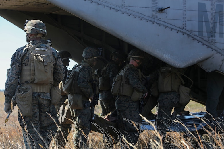 Marines with India Company, 3rd Battalion, 6th Marine Regiment, conduct a simulated casualty evacuation as part of exercise Eager Response at Fort Stewart, Ga., Feb. 26, 2016. The battalion conducted the training with the support of a CH-53E Super Stallion operated by Marines with Marine Heavy Helicopter Squadron 366. During Exercise Eager Response, Marines trained in events such as casualty evacuation, assault support missions and aerial refueling, proving the Marine Air-Ground Task Force is a highly effective combat force. (U.S. Marine Corps photo by Cpl. Paul S. Martinez/Released)